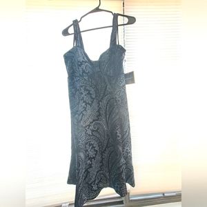 Karin Stevens vintage black dress with blue paisley glitter design. Size 8